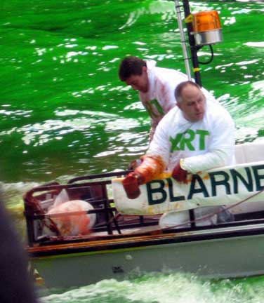 Orange on his Hands Dyeing the Chicago River Green